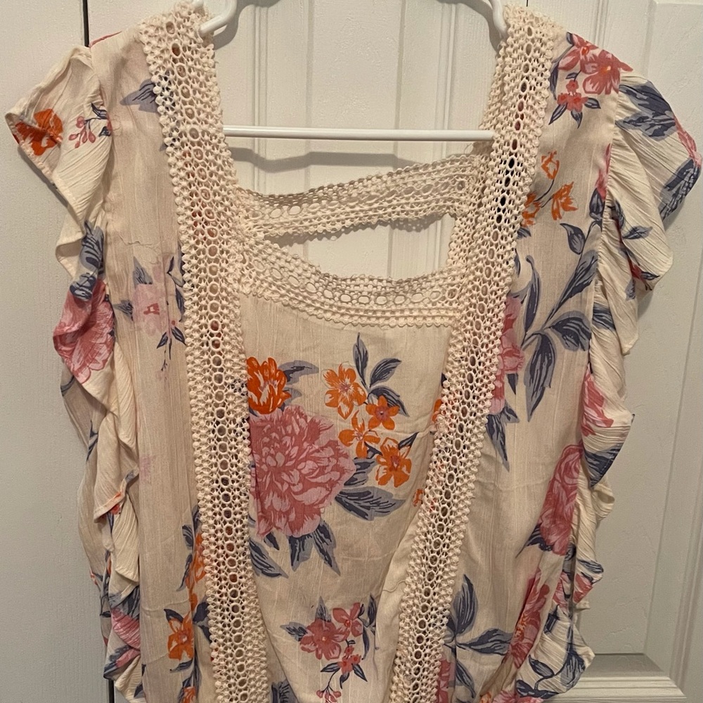 Ruffled sleeveless top from The Buckle